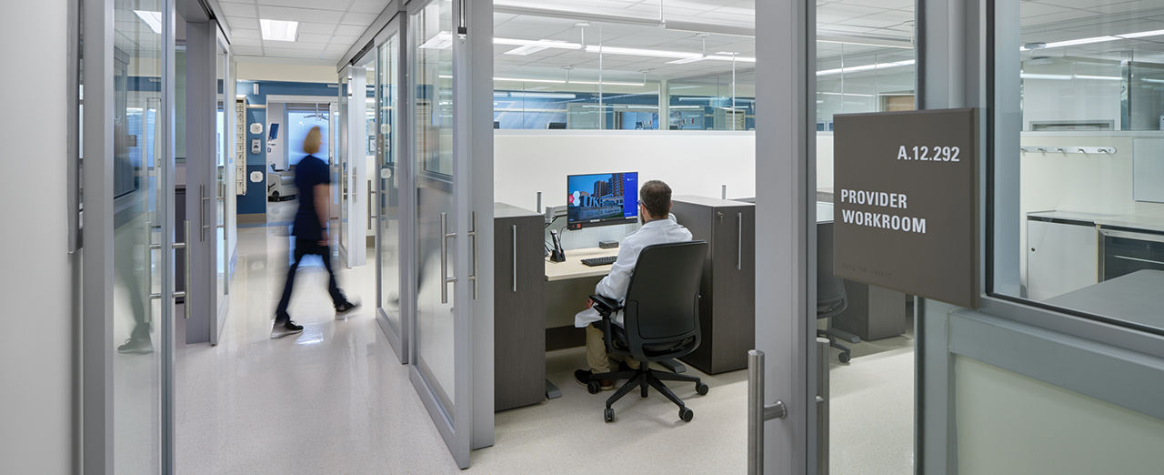 Inside a lab with soundproof acoustic sliding doors enhancing the healthcare environment.