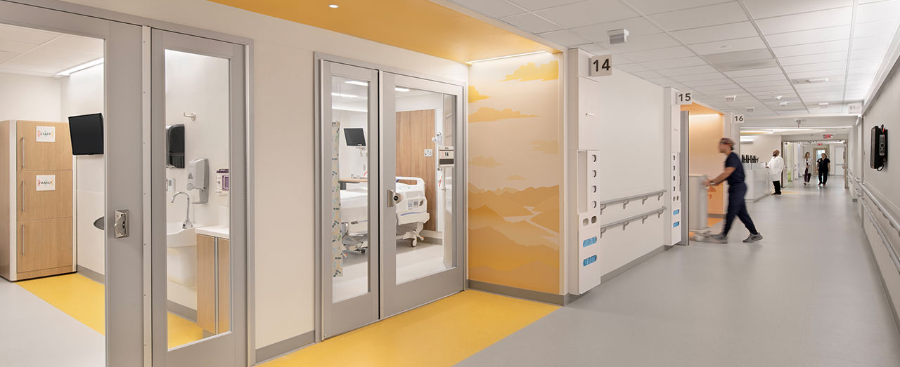 Bright hallway showcasing ADA compliant doors suitable for healthcare environments