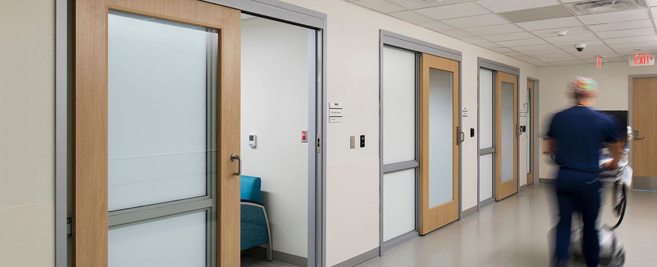 Sliding office doors and DualSwing systems in a hospital setting. 